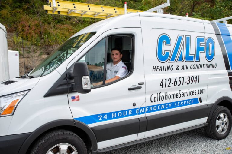 Calfo heating and air conditioning employee in company vehicle pittsburgh